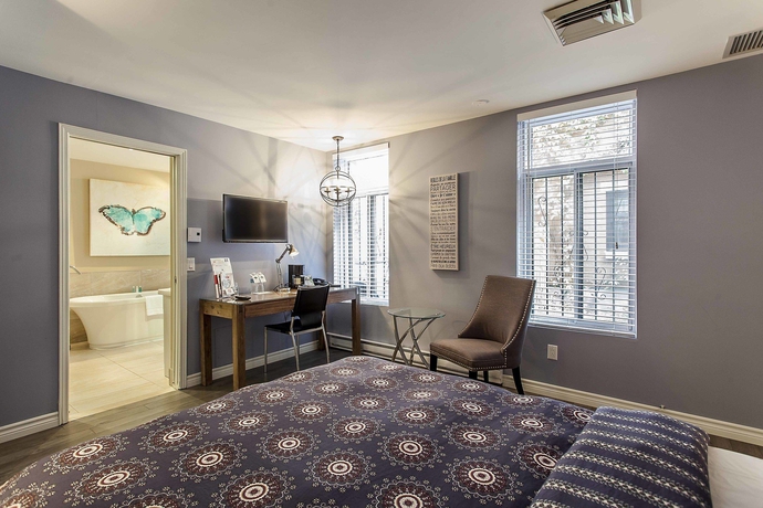 Imagen de la habitación del Hotel Auberge De La Fontaine. Foto 9