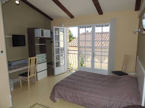 Imagen de la habitación del Hotel Auberge Des Charmilles. Foto 6