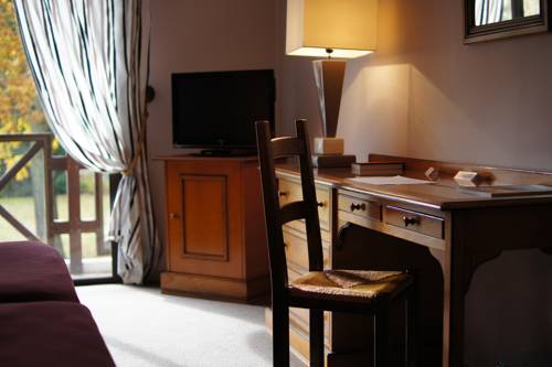 Imagen de la habitación del Hotel Auberge Des Pins. Foto 2