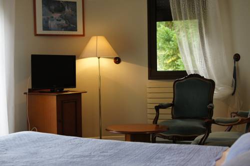 Imagen de la habitación del Hotel Auberge Des Pins. Foto 7