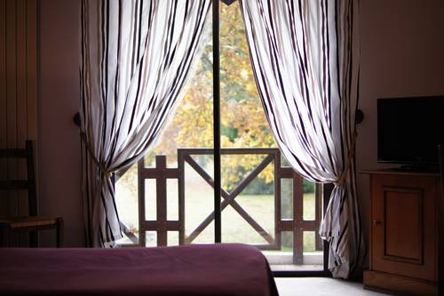 Imagen de la habitación del Hotel Auberge Des Pins. Foto 16