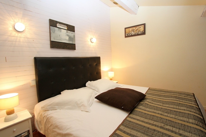 Imagen de la habitación del Hotel Auberge Des Pins, Tourrettes. Foto 11