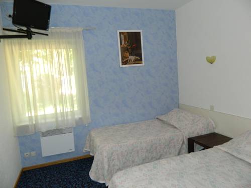 Imagen de la habitación del Hotel Auberge Des Sablons. Foto 2