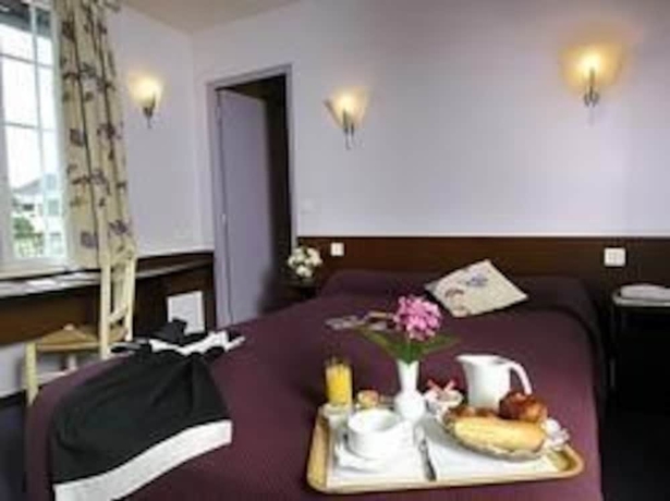 Imagen de la habitación del Hotel Auberge Des Vieux Ch&ecirc;nes. Foto 14