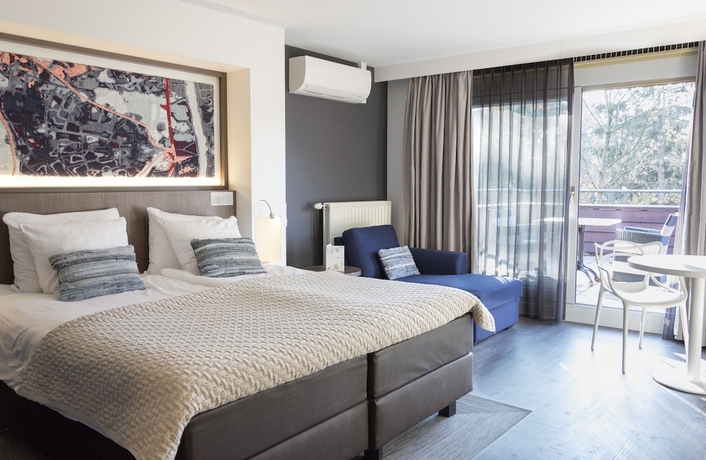 Imagen de la habitación del Hotel Auberge Du Bonheur. Foto 9