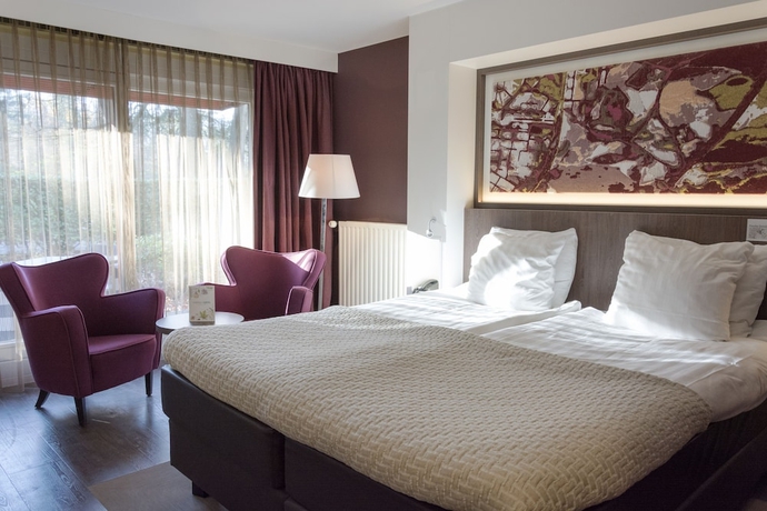 Imagen de la habitación del Hotel Auberge Du Bonheur. Foto 10