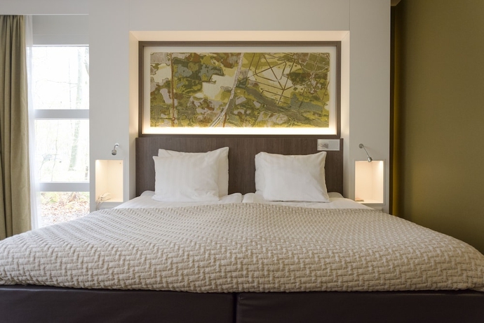 Imagen de la habitación del Hotel Auberge Du Bonheur. Foto 12