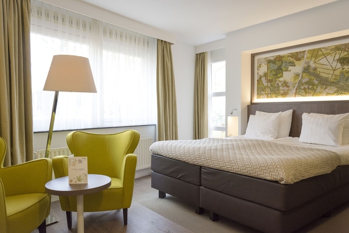 Imagen de la habitación del Hotel Auberge Du Bonheur. Foto 13