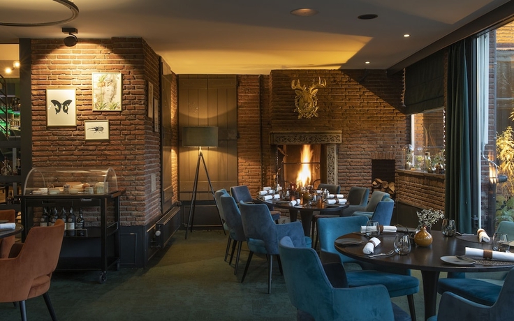 Imagen del bar/restaurante del Hotel Auberge Du Bonheur. Foto 7