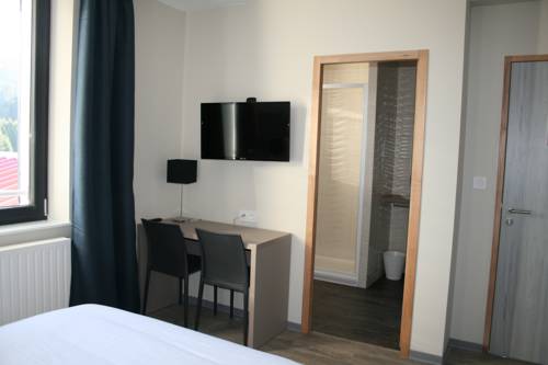 Imagen de la habitación del Hotel Auberge Du Ch&acirc;teau De Joux. Foto 10
