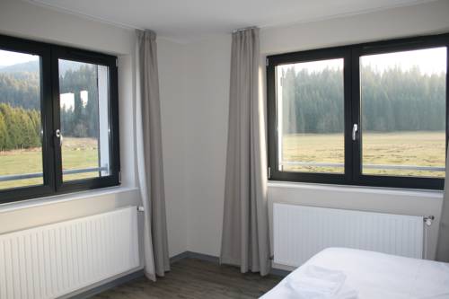 Imagen de la habitación del Hotel Auberge Du Ch&acirc;teau De Joux. Foto 15