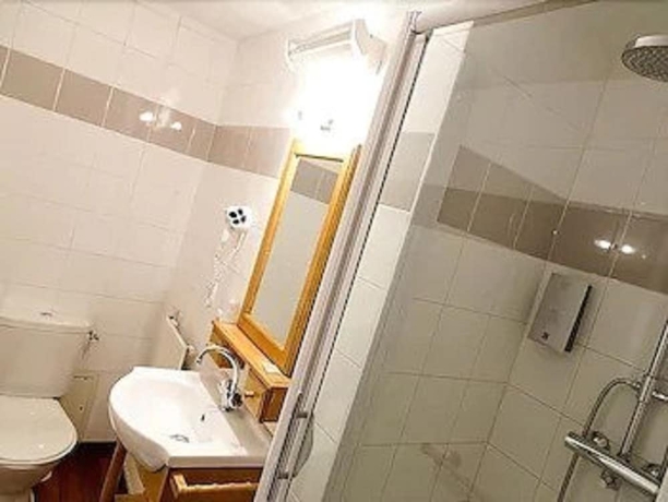 Imagen de la habitación del Hotel Auberge Du Cheval Blanc, Rennes. Foto 12