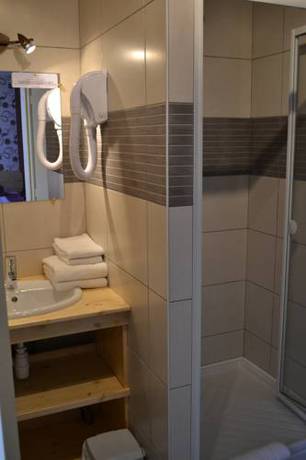Imagen de la habitación del Hotel Auberge Du H&eacute;risson. Foto 7