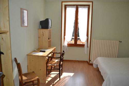 Imagen de la habitación del Hotel Auberge Du H&eacute;risson. Foto 8