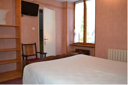Imagen de la habitación del Hotel Auberge Du H&eacute;risson. Foto 9