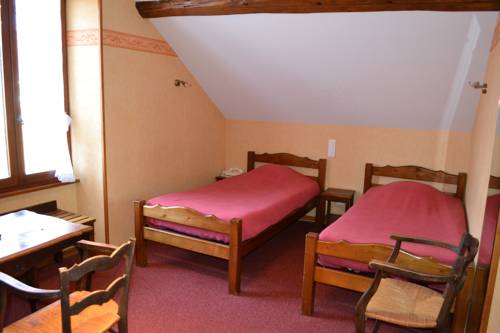 Imagen de la habitación del Hotel Auberge Du H&eacute;risson. Foto 10