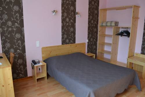 Imagen de la habitación del Hotel Auberge Du H&eacute;risson. Foto 12