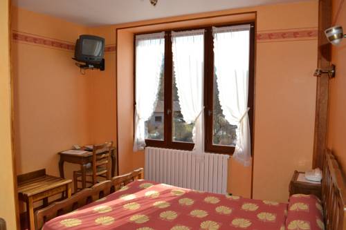 Imagen de la habitación del Hotel Auberge Du H&eacute;risson. Foto 14