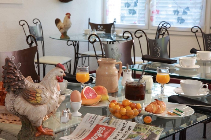 Imagen del bar/restaurante del Hotel Auberge Du Parc. Foto 2