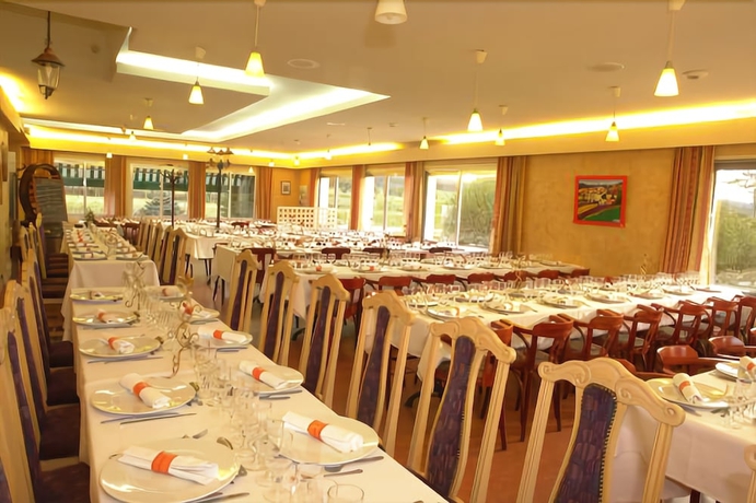 Imagen del bar/restaurante del Hotel Auberge Du Parc. Foto 9