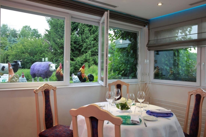 Imagen del bar/restaurante del Hotel Auberge Du Parc. Foto 10