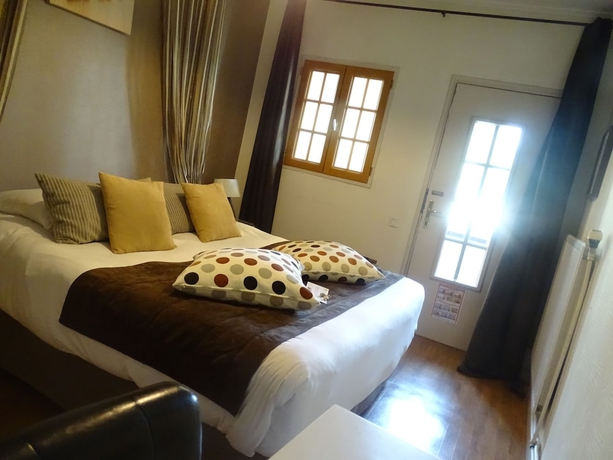 Imagen de la habitación del Hotel Auberge Du President. Foto 10