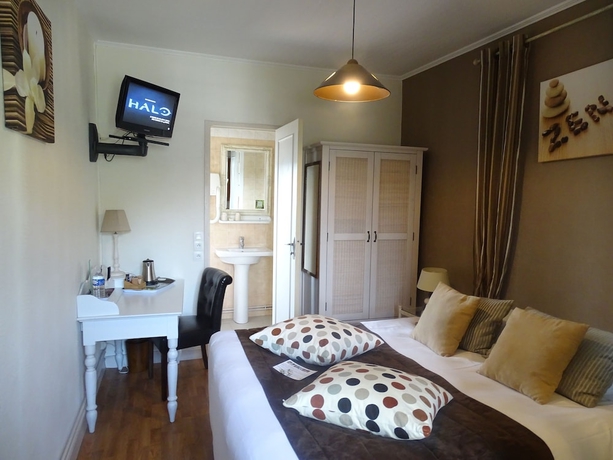 Imagen de la habitación del Hotel Auberge Du President. Foto 11