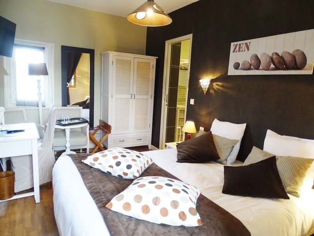 Imagen de la habitación del Hotel Auberge Du President. Foto 15