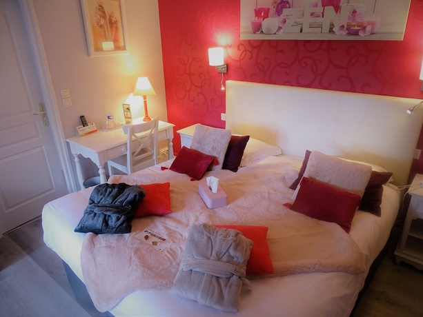 Imagen de la habitación del Hotel Auberge Du President. Foto 16