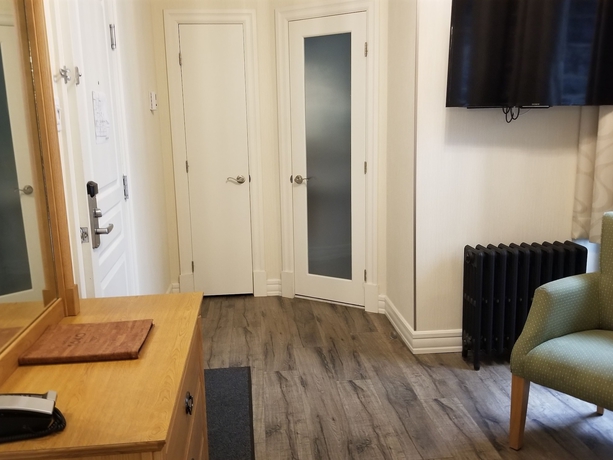 Imagen de la habitación del Hotel Auberge Du Tresor. Foto 14