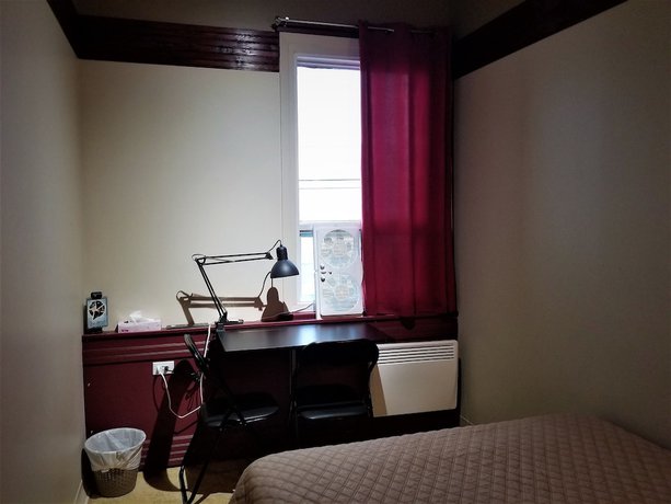 Imagen de la habitación del Hotel Auberge Internationale La Vieille &Eacute;cole. Foto 8