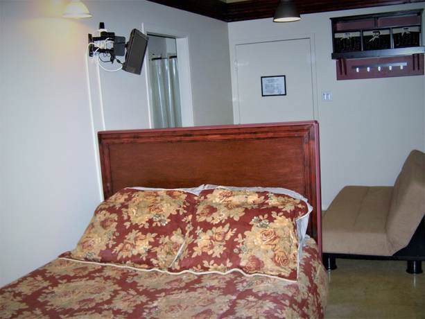 Imagen de la habitación del Hotel Auberge Internationale La Vieille &Eacute;cole. Foto 11