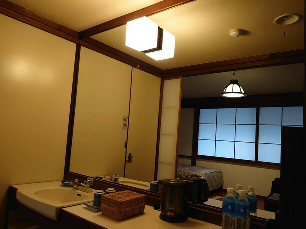 Imagen de la habitación del Hotel Auberge Kunugiya. Foto 11