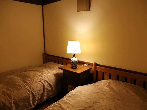 Imagen de la habitación del Hotel Auberge Kunugiya. Foto 17