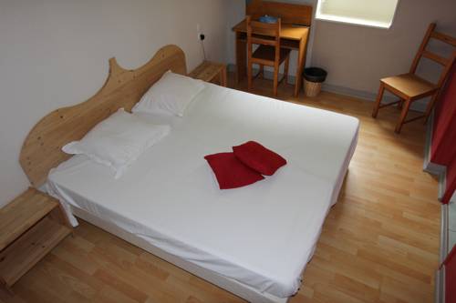 Imagen de la habitación del Hotel Auberge La Caverne. Foto 3
