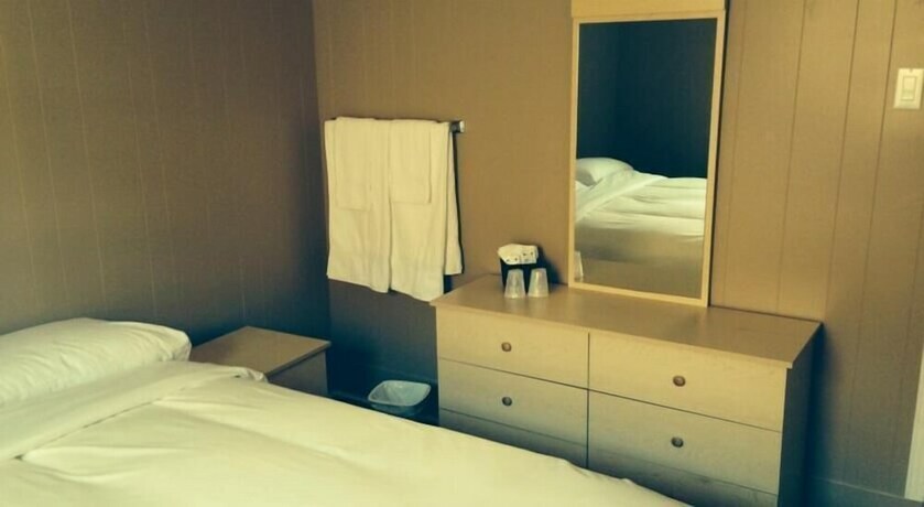 Imagen de la habitación del Hotel Auberge Lac St-jean. Foto 23