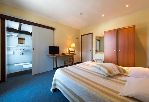 Imagen de la habitación del Hotel Auberge Le Xix Eme. Foto 6