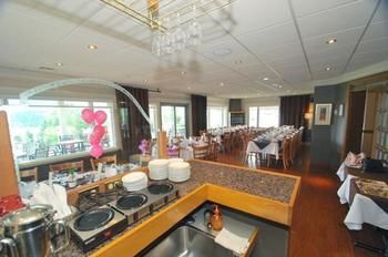 Imagen de los interiores del Hotel Auberge Resto Le Parasol. Foto 13