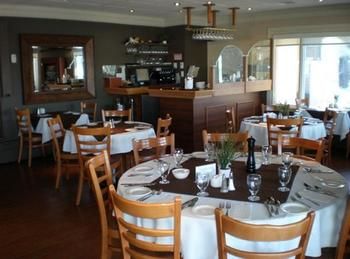 Imagen del bar/restaurante del Hotel Auberge Resto Le Parasol. Foto 9