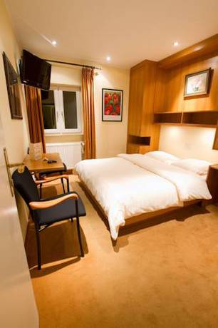 Imagen de la habitación del Hotel Auberge Rustique. Foto 4