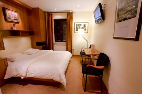 Imagen de la habitación del Hotel Auberge Rustique. Foto 6