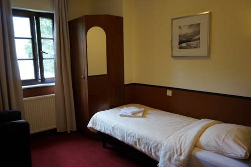 Imagen de la habitación del Hotel Auberge Rustique. Foto 8