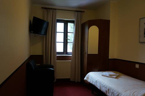 Imagen de la habitación del Hotel Auberge Rustique. Foto 9