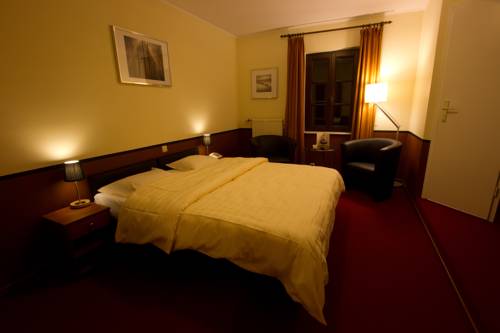 Imagen de la habitación del Hotel Auberge Rustique. Foto 10
