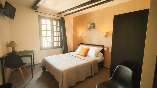 Imagen de la habitación del Hotel Auberge Saint Jacques. Foto 8