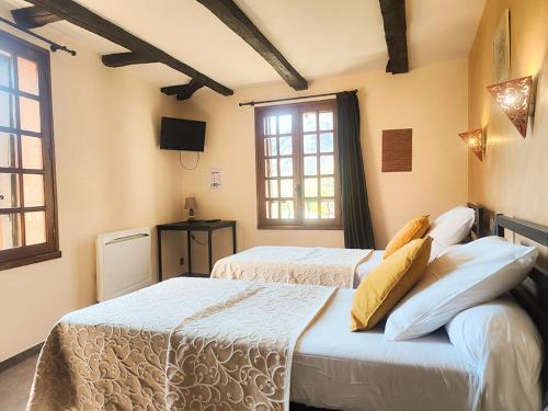 Imagen de la habitación del Hotel Auberge Saint Jacques. Foto 11