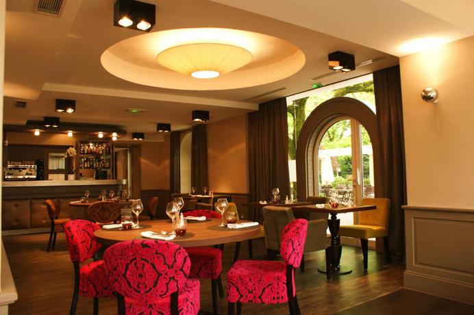 Imagen del bar/restaurante del Hotel Auberge Saint Simond. Foto 2