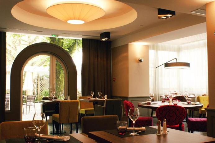 Imagen del bar/restaurante del Hotel Auberge Saint Simond. Foto 3