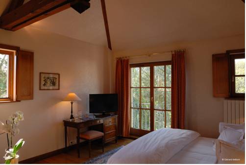 Imagen de la habitación del Hotel Auberge Saint Walfrid. Foto 8