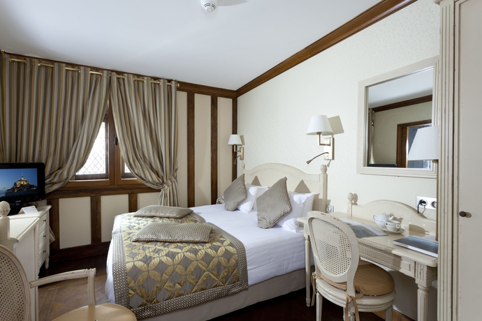 Imagen de la habitación del Hotel Auberge Saint-pierre, Mont Saint Michel. Foto 12